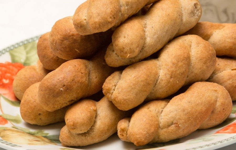 close-up of 'kuluraki' Greek Easter cookies on the top of each other at 'M. Kosmidis'